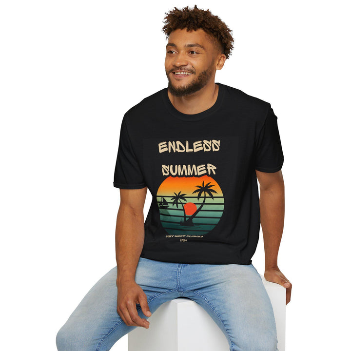 May include: A black t-shirt with a graphic print of a sunset over a beach with palm trees. The text on the shirt reads 'Endless Summer' and 'Key West Florida 1979'.